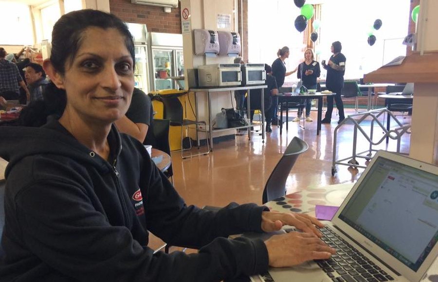 Woman with digital literacy skills setting up an email account